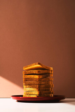 Toasted bread slices heap on a plate