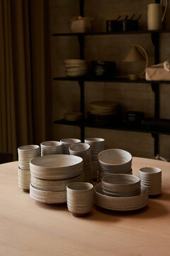 Stacks of ceramic dishware on the table