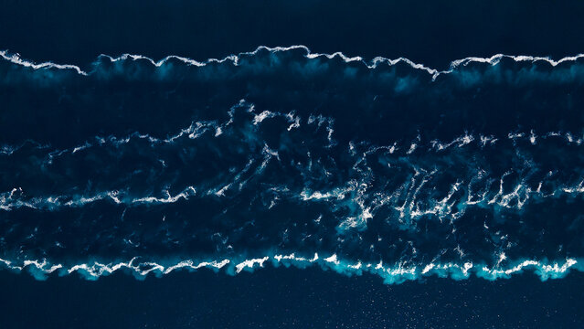Aerial Perspective of Trail in Water from Passing Cruiser