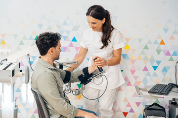 Patient undergoing robotic arm therapy
