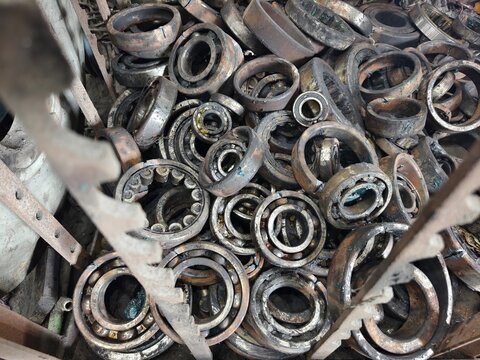 Scrap bearing stacked and stored in a factory