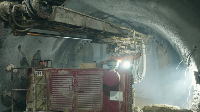 Work vehicle drilling in subway tunnel construction