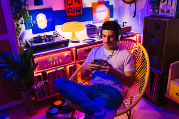 Man Sitting in Music Studio