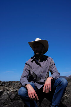 Man in Cowboy Hat