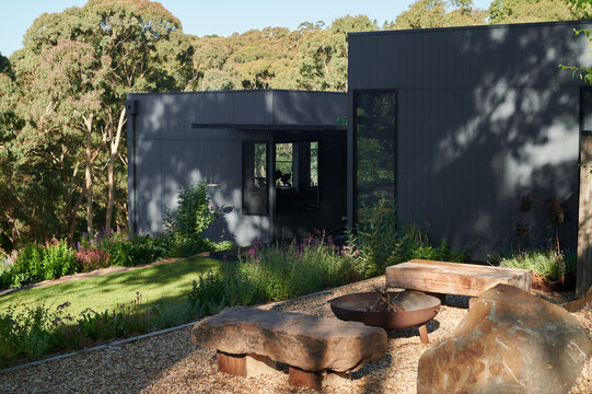 Modern home surrounded by nature with landscaped garden