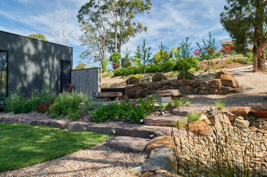 Modern garden landscape with native plants and stone features