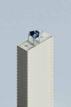 3D Render of Education Expense Symbol with Desk on Money Stack