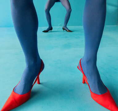 Abstract Fashion with Blue Tights and Red Heels