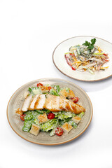 Dish of salad on white background