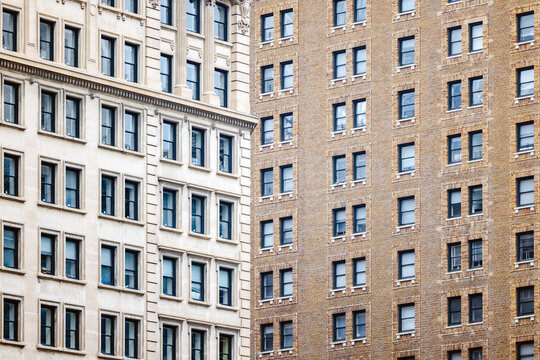 Close-up of contrasting facade designs on New York City buildings