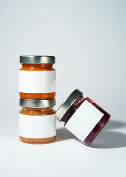 Glass Jars with blank white labels. Minimalistic product mockup