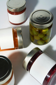 Glass Jars with blank white labels. Minimalistic product mockup