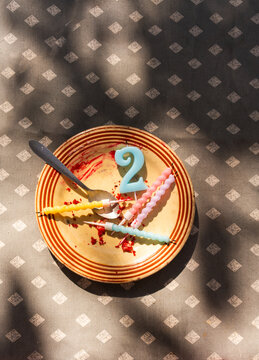 Birthday cake crumbs and candles