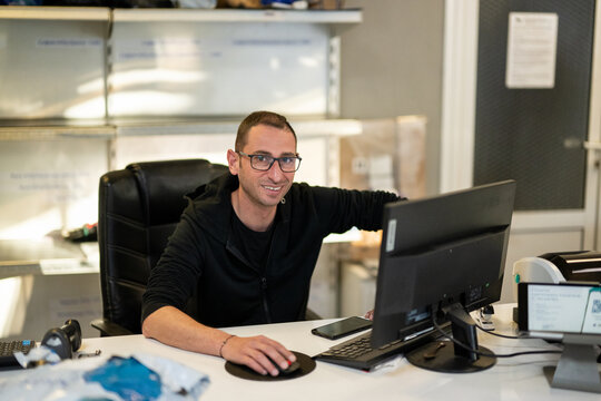 Package shop employee portrait