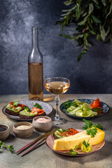 Gourmet cheese and salmon appetizers with rose wine pairing