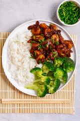 Shrimps in soy-honey sauce with rice and broccoli.selective focus