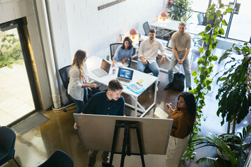 Workers paying attention to their bosses in a meeting