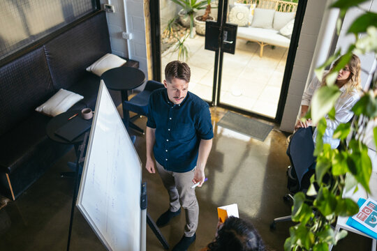 Coworkers giving a presentation in a meeting