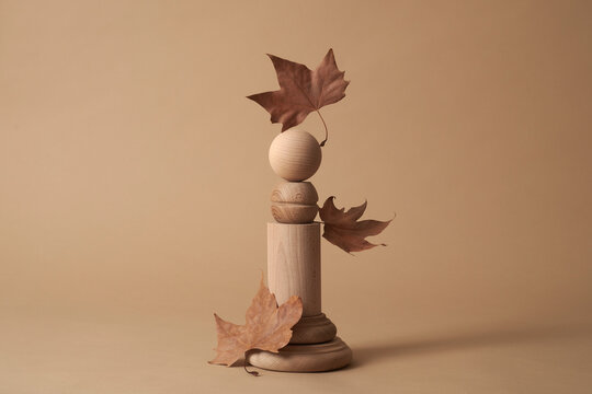 autumn leaves on a wooden column