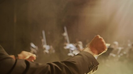 Orchestra Conductor Leading Symphony Hands Dramatic Lighting Musical Performance Music Expression