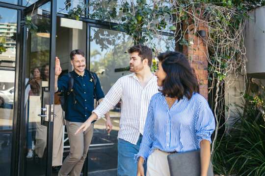 Teamwork leaving the office after a workday