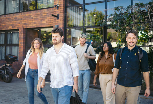 Coworkers leaving the office after a workday