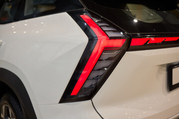 Obraz premium Closeup of a cars automotive tail brake light