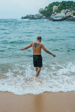 Man standing in  ocean water