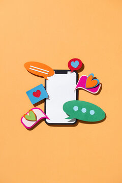 Colorful Paper Art Smartphone with Social Media Icons