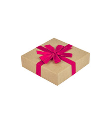 Paper box with a gift tied with a bow