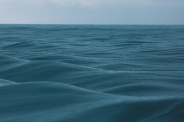 Undulating waves at sea.