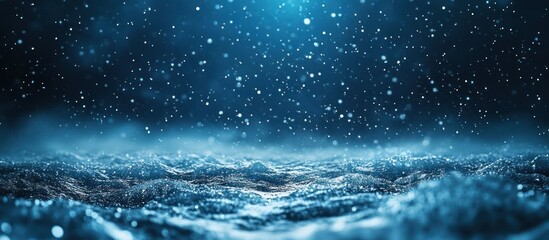 Abstract blue winter background with snowflakes falling on a frosty surface.