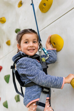 Happy Kid climbing 