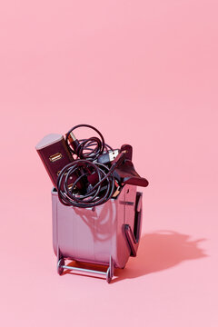 electrical cables in a trash container