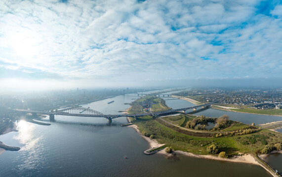 Aerial view of the room for the river project at the Dutch city of Nijmegen, with constructed additional waterway to provide more space for the Waal river during high water, future proof design