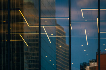 Reflections of skyscrapers and modern architecture in NYC