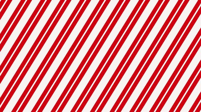 Candy cane striped Christmas wrapping paper transitions on a green screen background.