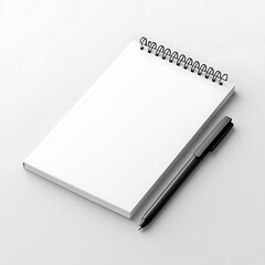 Blank Spiral Notebook and Pen on a White Surface