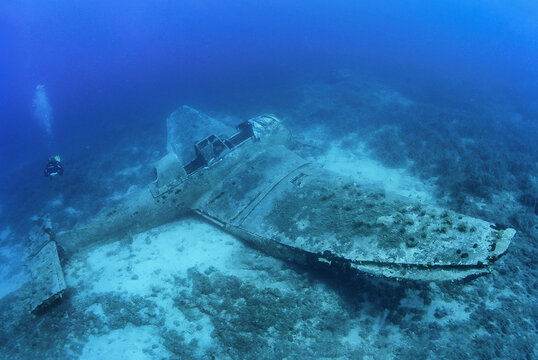 Airplane wreck on the sea floor.