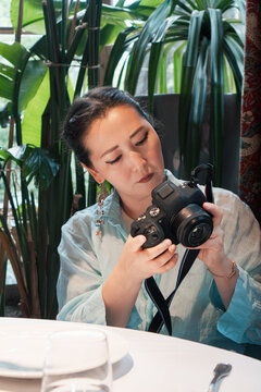 Focused Photographer with Camera