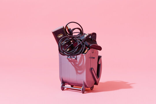 cables and chargers in a waste container