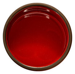 Top view of a red ceramic bowl isolated on white. Perfect for food styling, kitchen decor, or design elements.