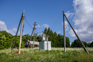 Electricity transformer station in a rural meadow