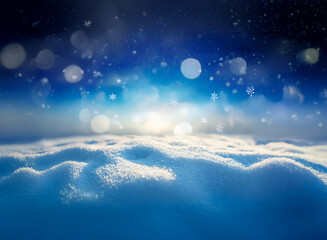 A snowy landscape with a bright, sunlit horizon.