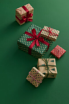 Festive Gift Boxes with Polka Dot Wrapping and Red Bows
