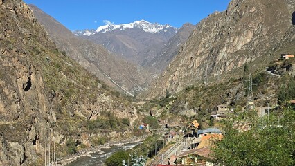 View of the Urubamba River in the Sacred Valley at km 82 Inca Trail with snow on the mountain peaks...