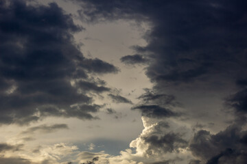 big clouds in the sky before the storm at sunset