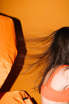 Dynamic Expression of Movement and Energy in Bright Orange