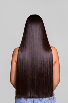 Woman with Long, Straight Dark Hair Viewed from Behind