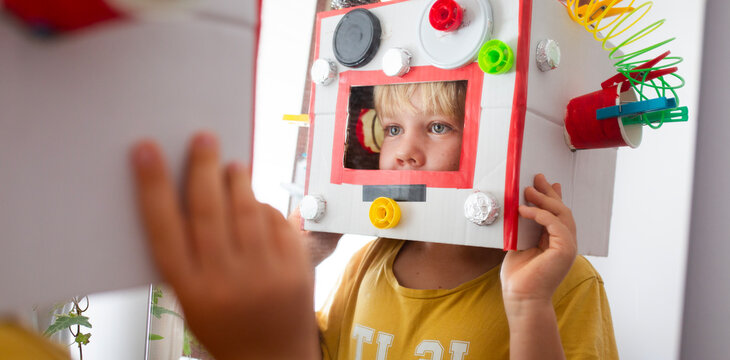 Boy dressed DIY robot mask 